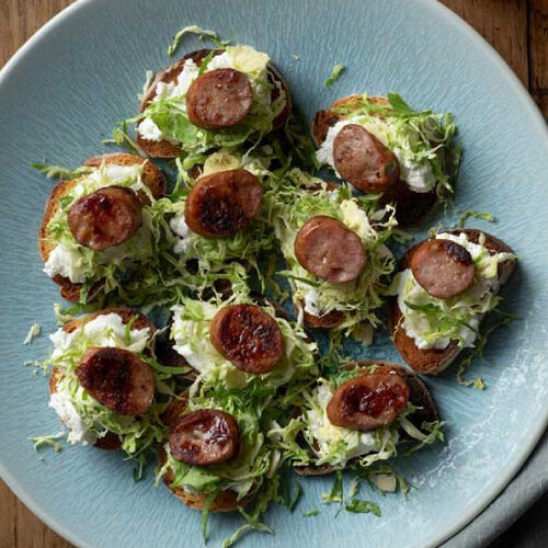 Sausage, Goat Cheese and Brussels Sprouts Crostini