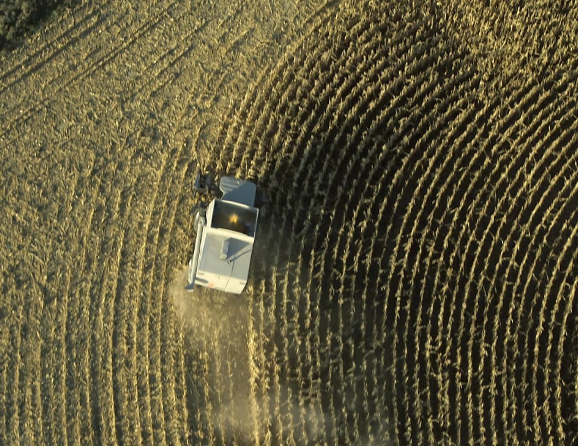 tractor plowing farm field